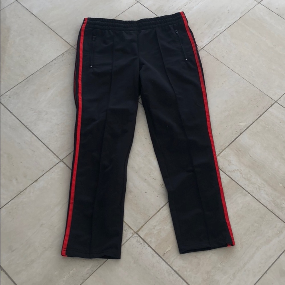 Black pants with red stripe